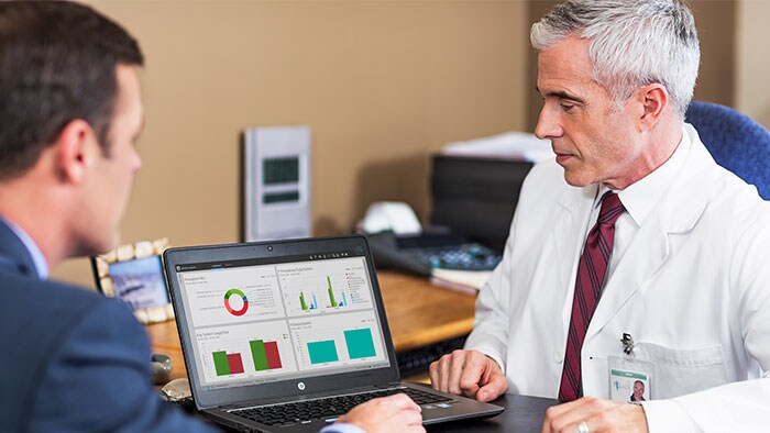 Doctors checking graphic