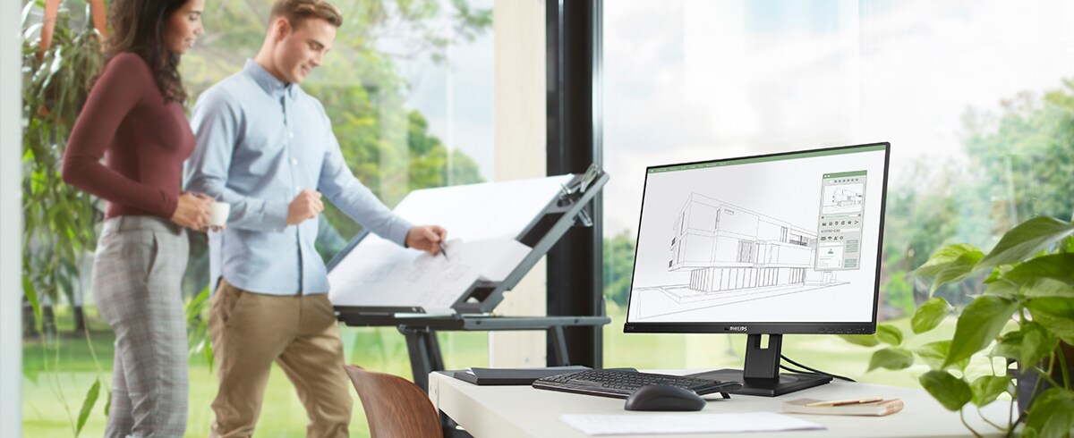 Lidé si užívají pracoviště s ekologickými monitory Philips s nízkým dopadem na životní prostředí.