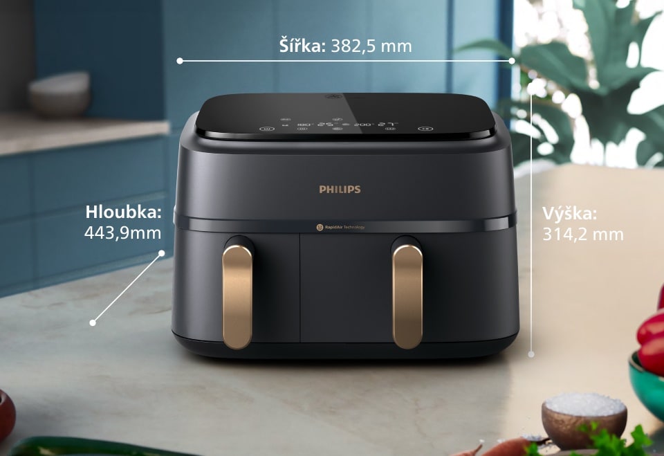 Fritéza Philips se dvěma košíky stojící na kuchyňské lince se všemi popsanými rozměry: šířka – 38,25 cm, hloubka – 31,42 cm, výška – 44,39 cm